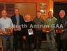 Winning Quiz team Cathaoir an ri being presented by North Antrim Chairman Owen Elliott